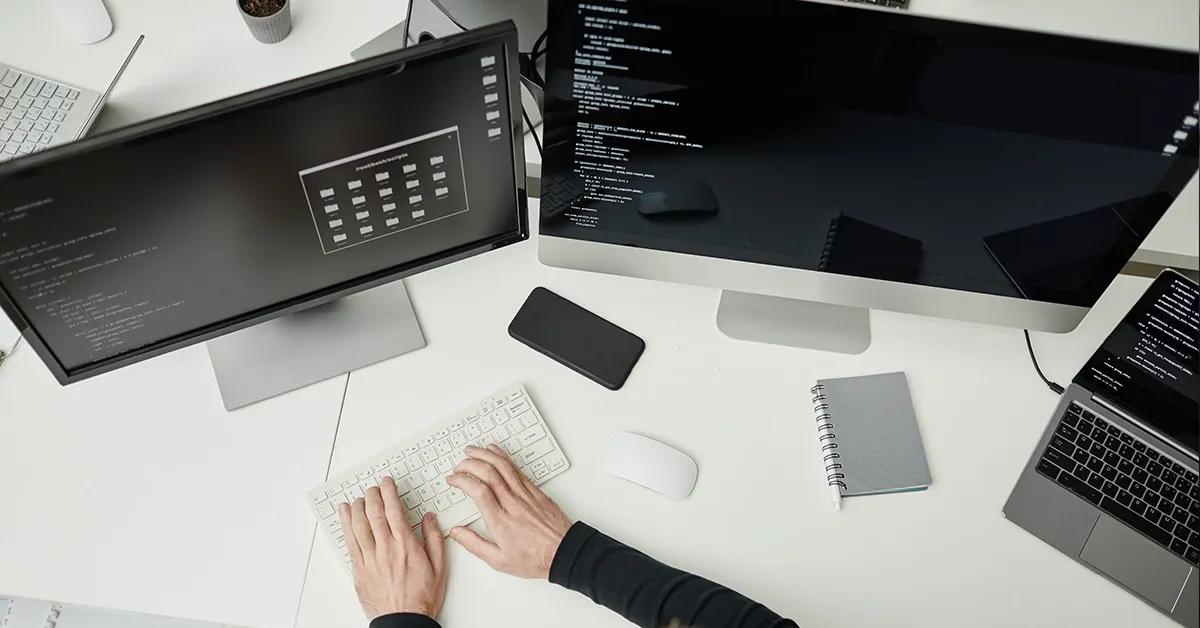 Man typing on a keyboard