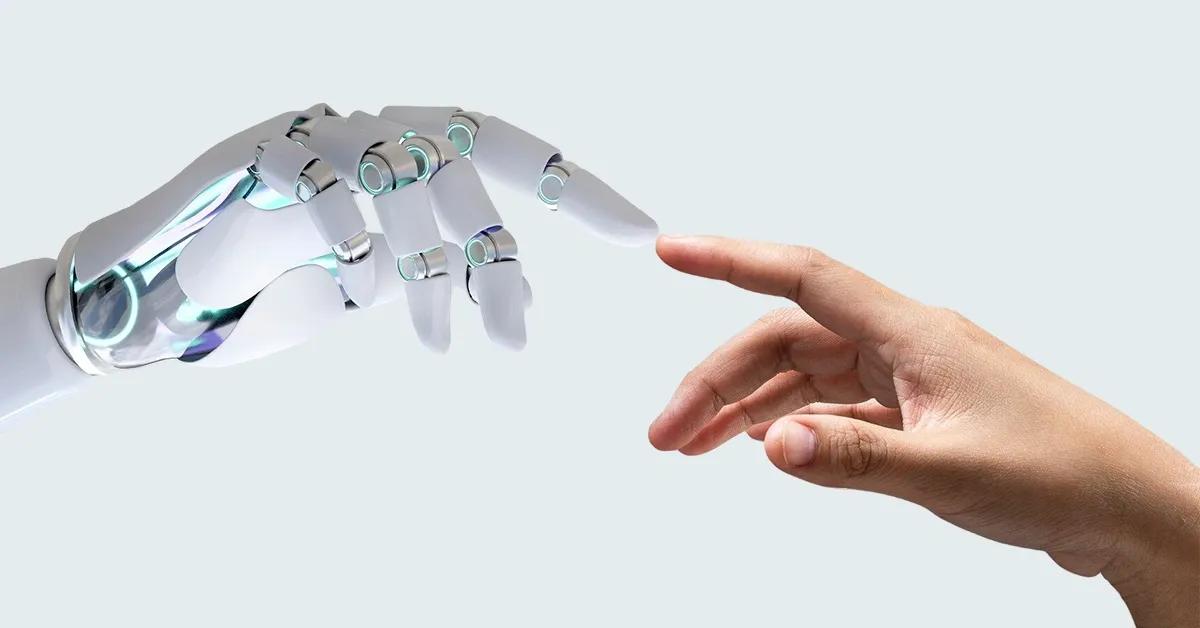 Robotic hand and human hand touching