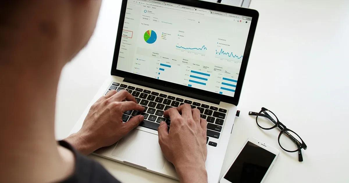 Man analyzing data on his laptop