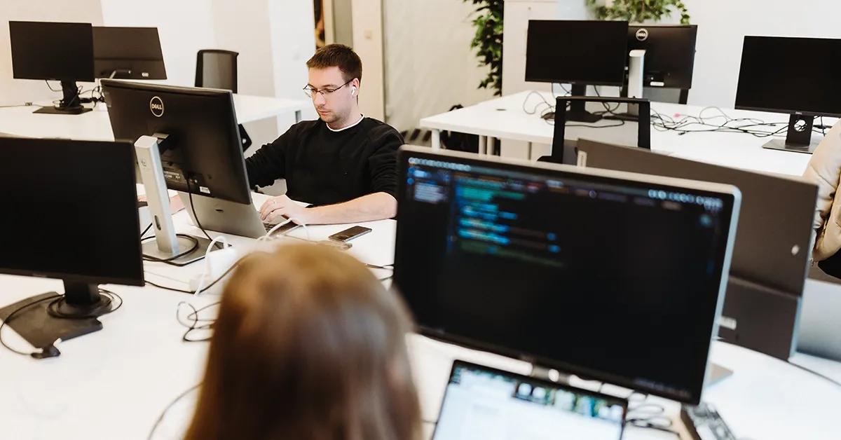 Software testing team working in an office