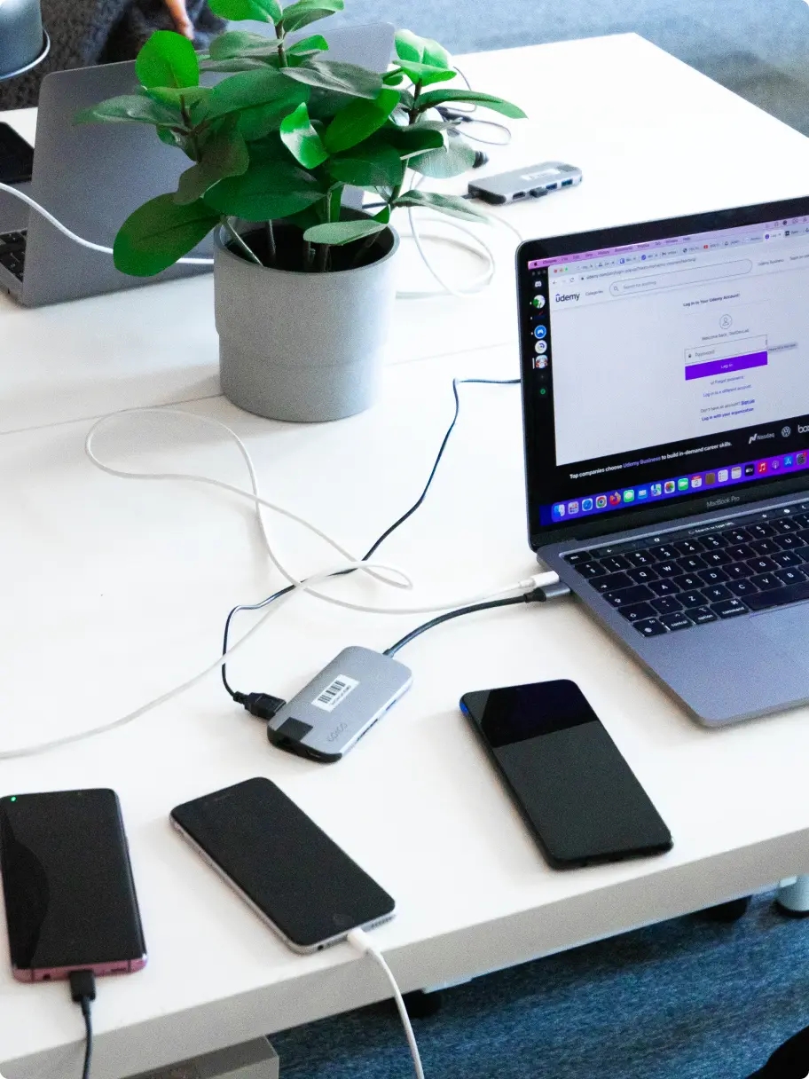 Performance testing devices and QA engineer working together