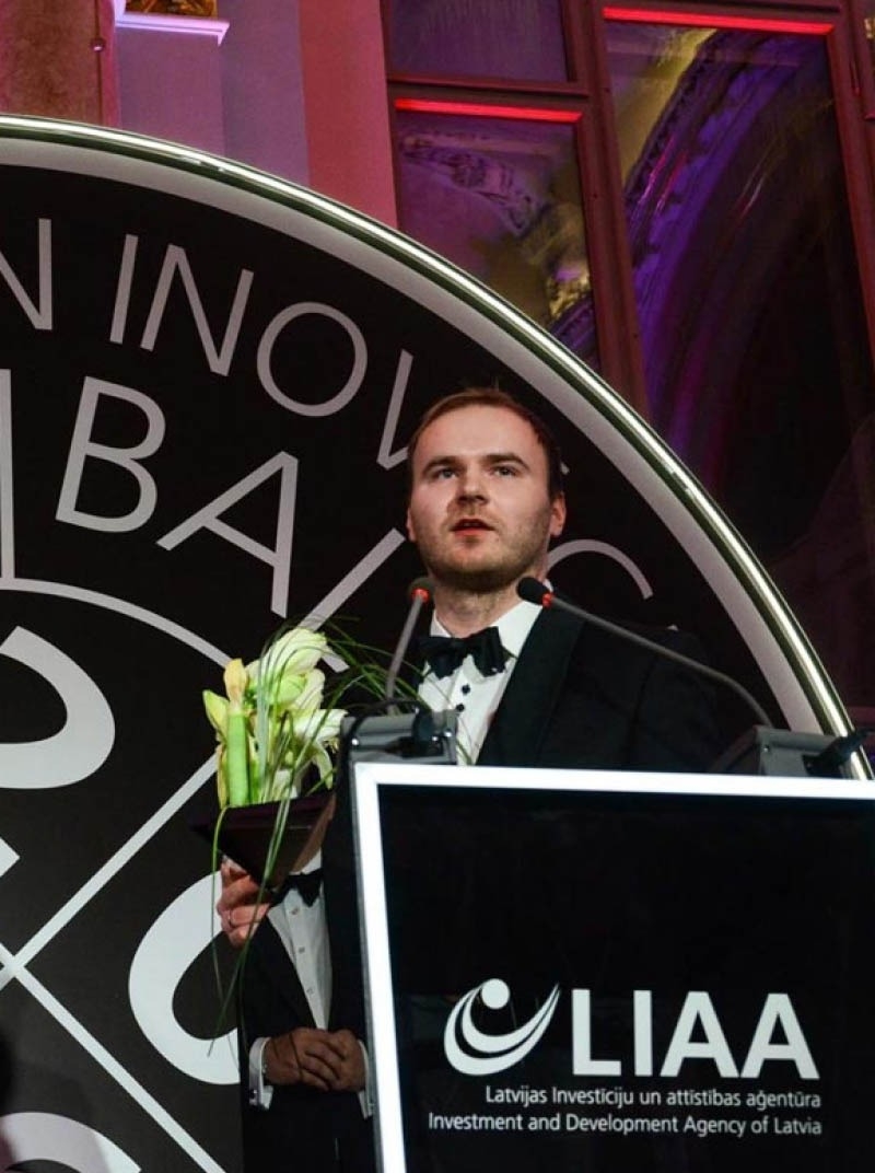 TestDevLab co-ceo, Ervins Grinfelds, at an awards ceremony.