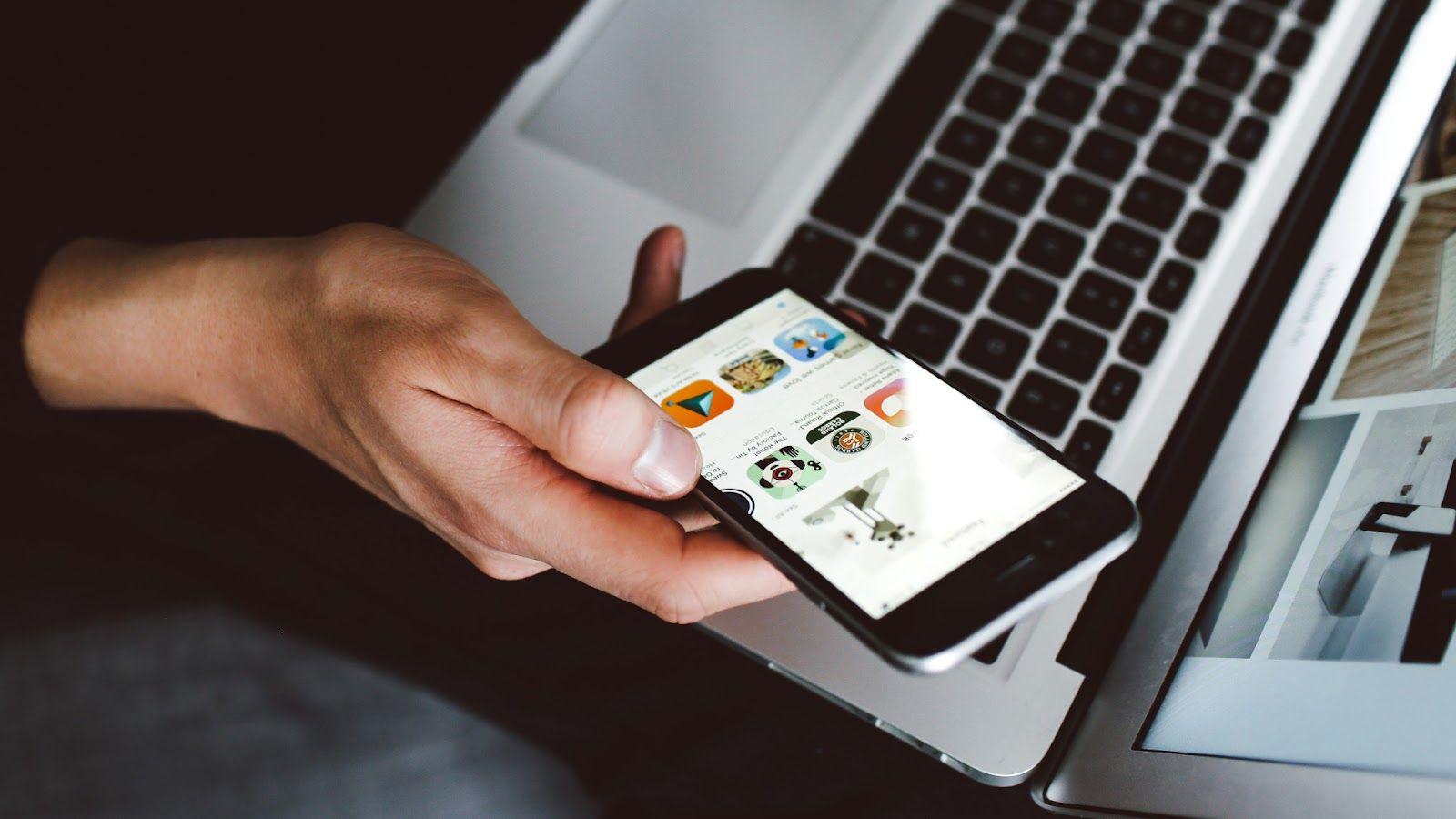 Mobile phone in the hand of a man