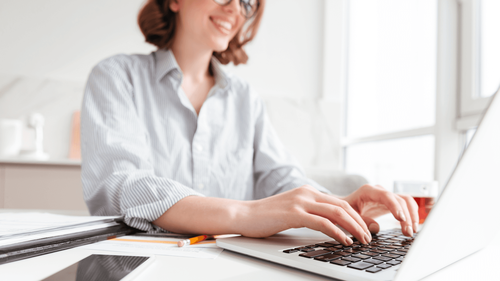 Woman is working on her computer