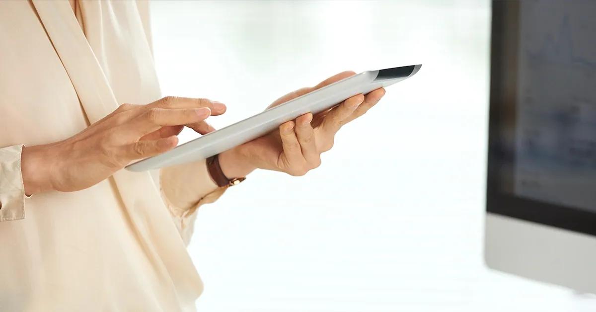 Woman holding a tablet