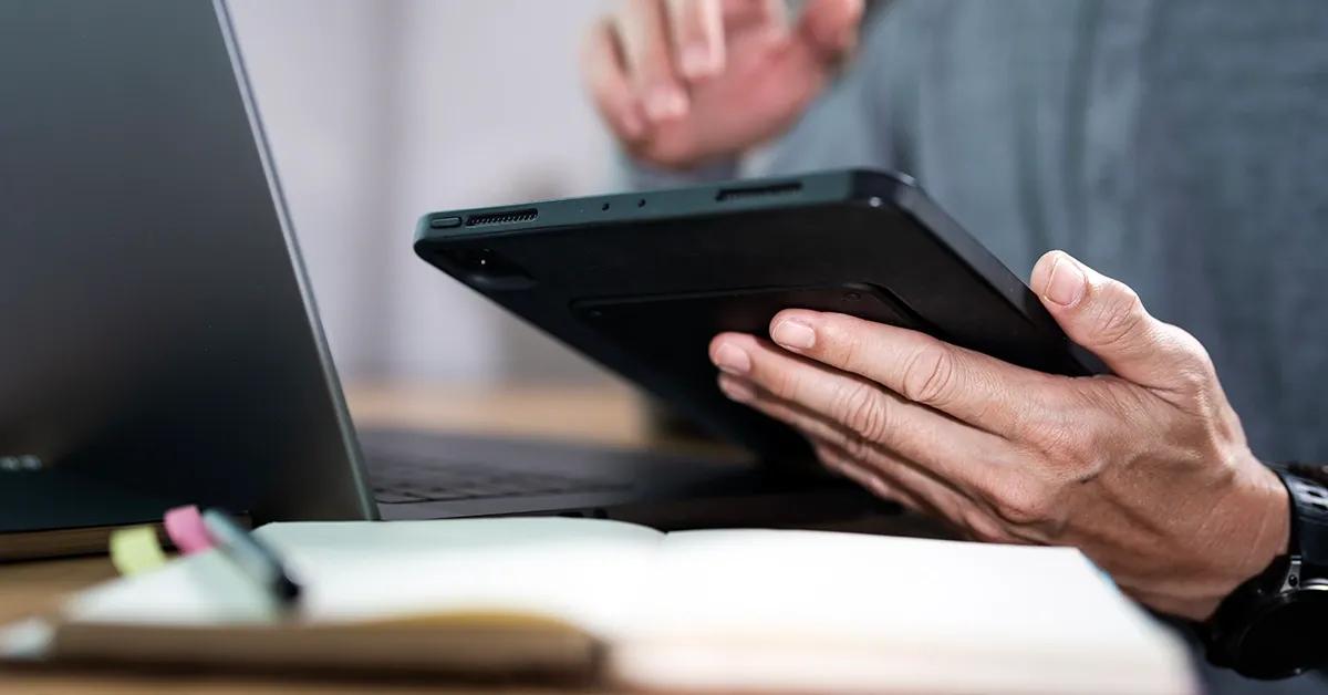 A man holding a tablet